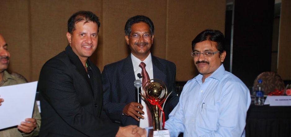 Participants holding a trophy