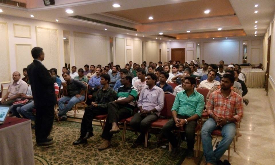 Speaker addressing a workshop audience