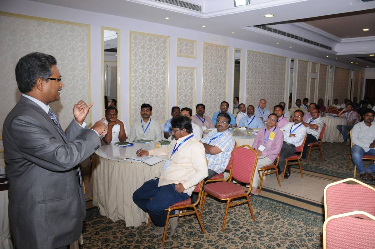 Trainer speaking to a seated group