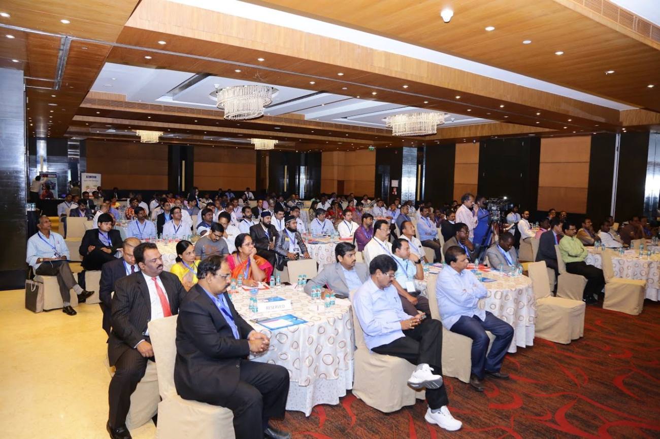 A large hall of seminar attendees